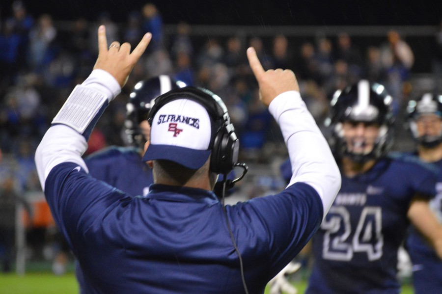 Coach signals his players in the home game against Rogers on September 18.