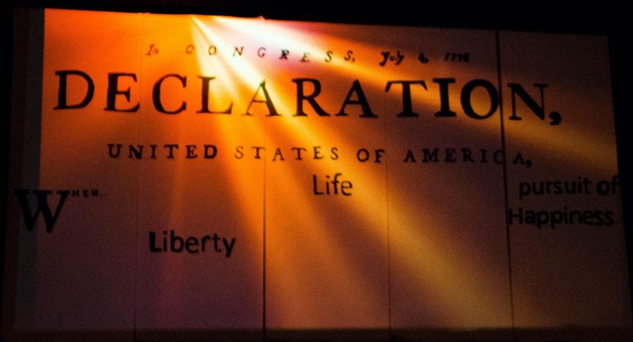 The backdrop of the One Act Competition Play - Declaration by Jonathon Dorf.