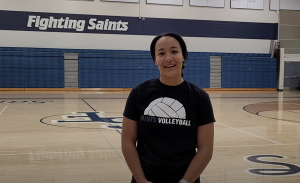 Navigation to Story: Student alumni takes the court as volleyball head coach