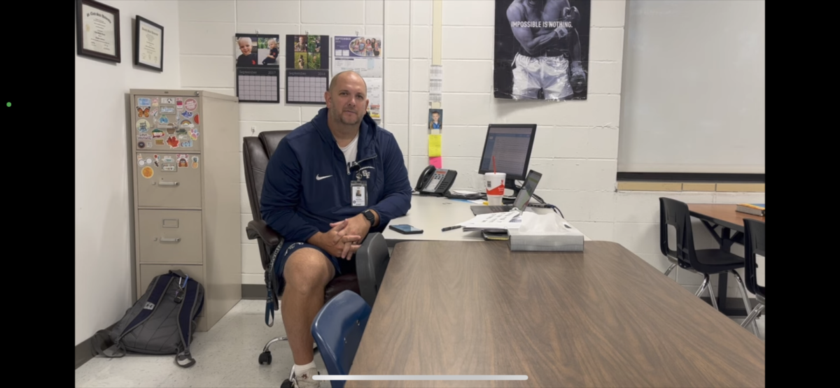 Head coach Torson speaks to media staff about the season 