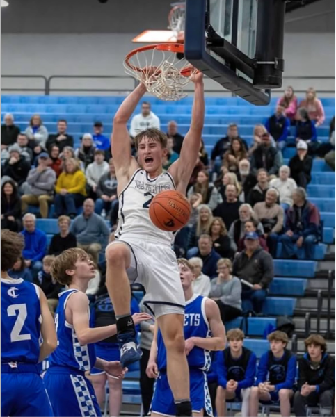 On January 2, 2024, Caleb Schoenrock gets a dunk on Cambridge Isanti during a game. 
